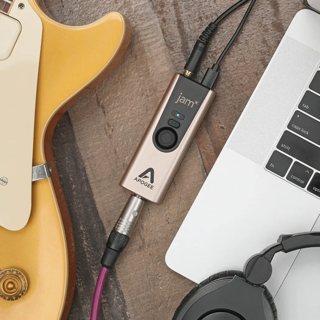 Jam X on a wood floor next to recording gear